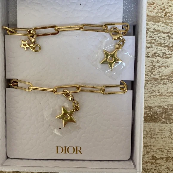 Dior gold phone charm NEW with box